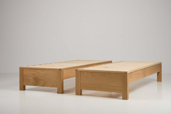 oak wooden zip link beds shown in king size and parted to make two singles