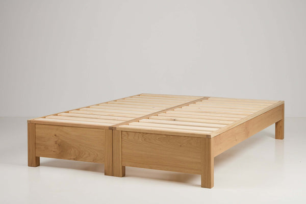 Zip link wooden beds king size when joined together and single beds when apart.