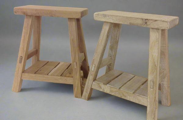 Old oak stools, milking stool, new stool made in an antique old stool style.
