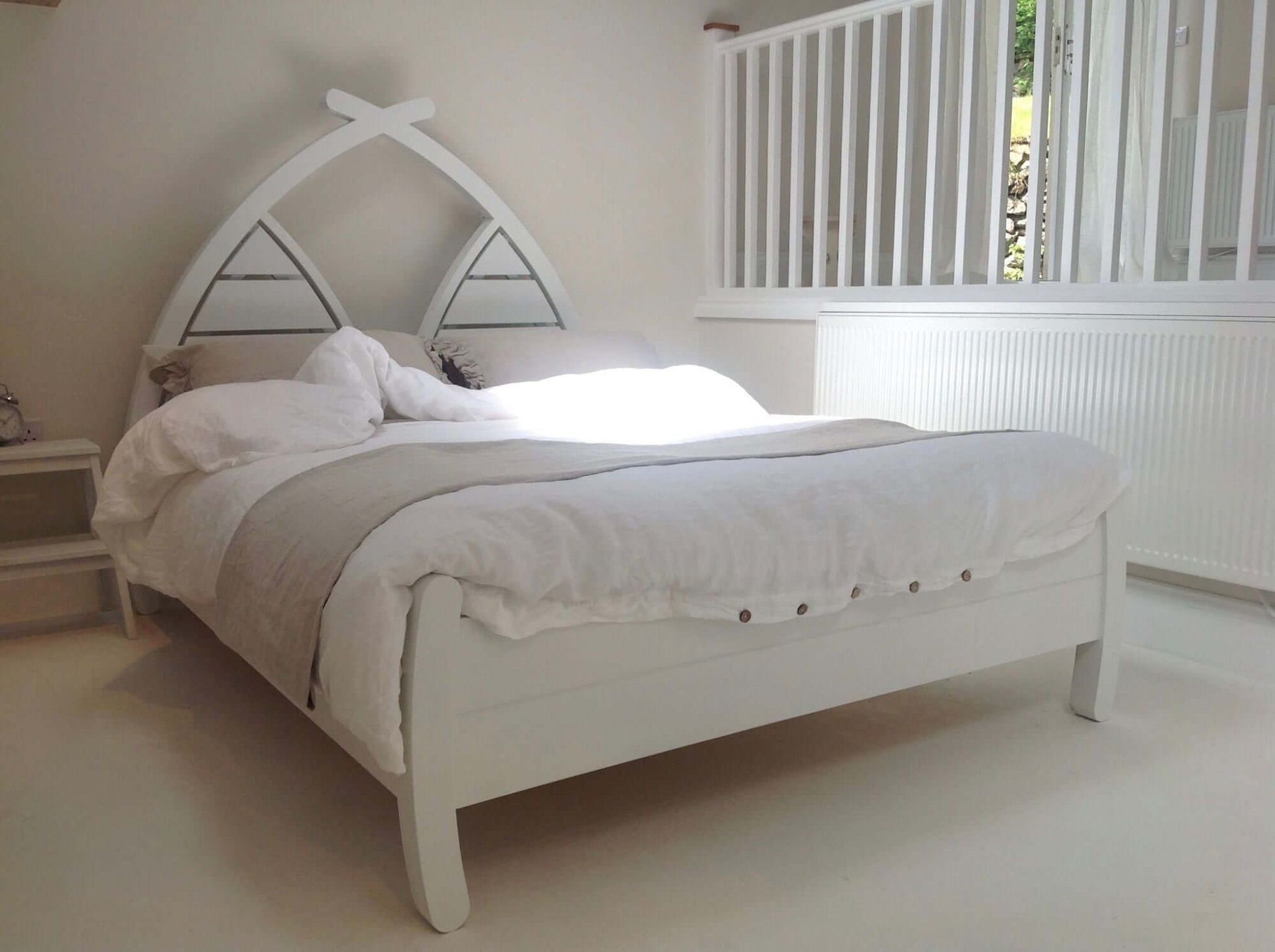 White painted wooden bedframe with arched headboard , handmade in UK